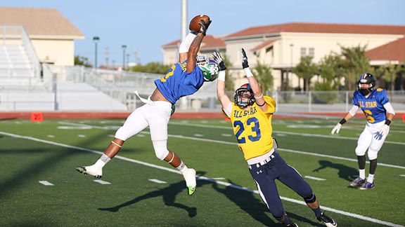 Bryan Pascual of the North team reaches up for an interception during the 2014 Lions All-Star Classic.