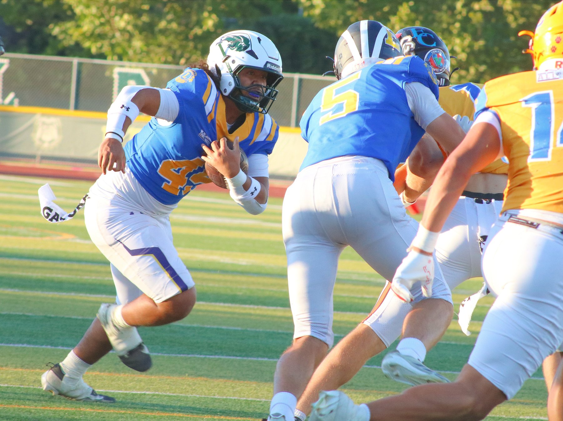 Maava Tialavea carries the ball for the North in the 2026 Lions All-Star Football Game